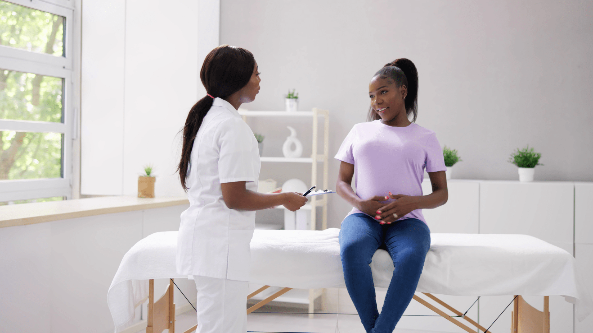 Fertility doctor explaining to a patient about egg retrieval