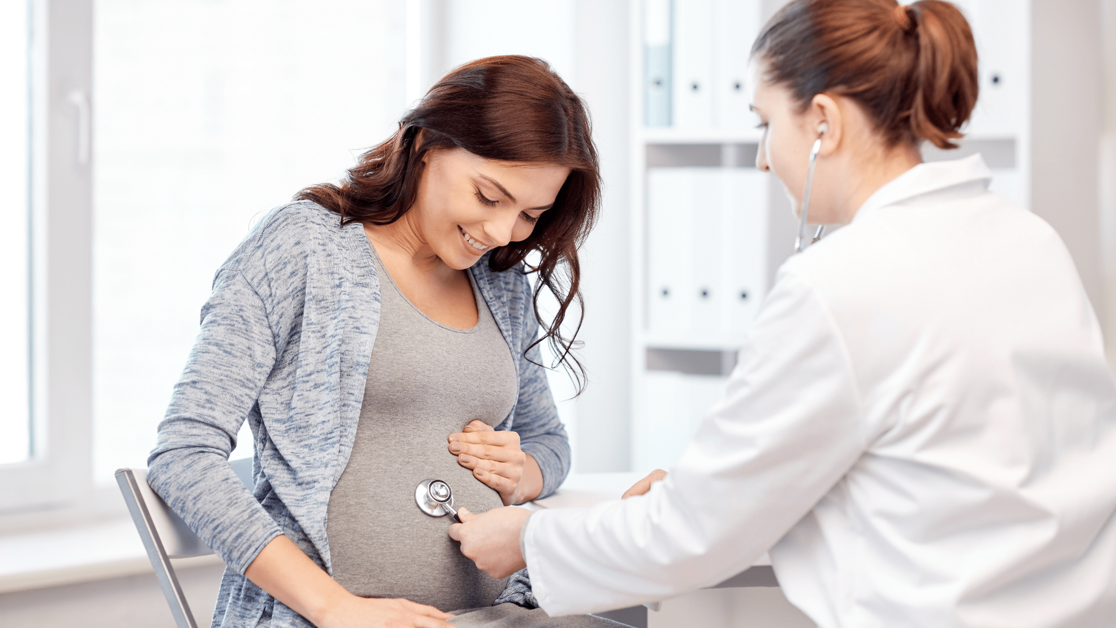 Female patient being examined for pelvic and abdominal pain linking to endometriosis and pregnancy.