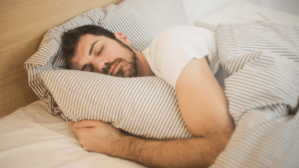 Man sleeping in a bed