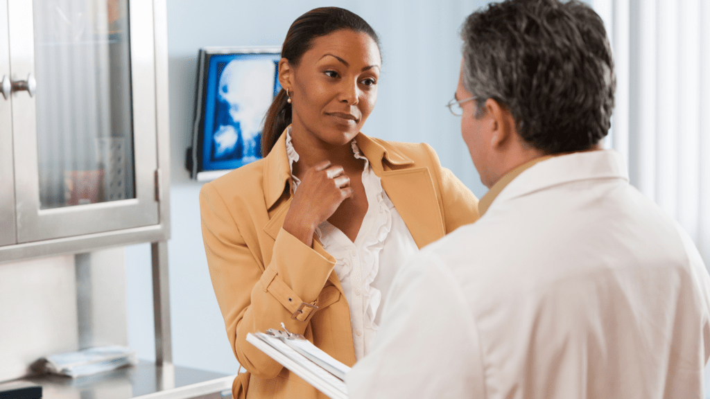 Women talking to her doctor