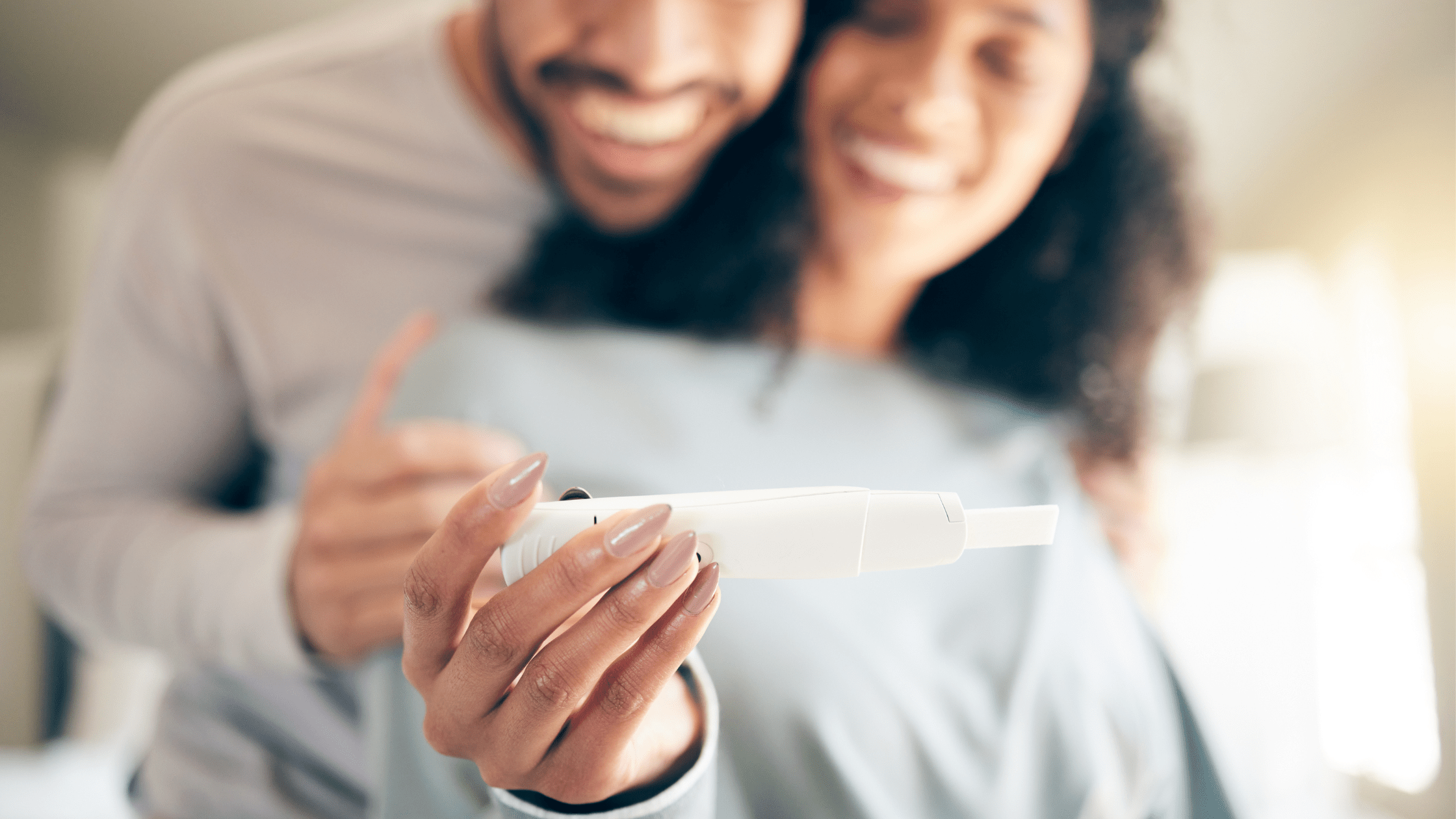 Couple looking at pregnancy test