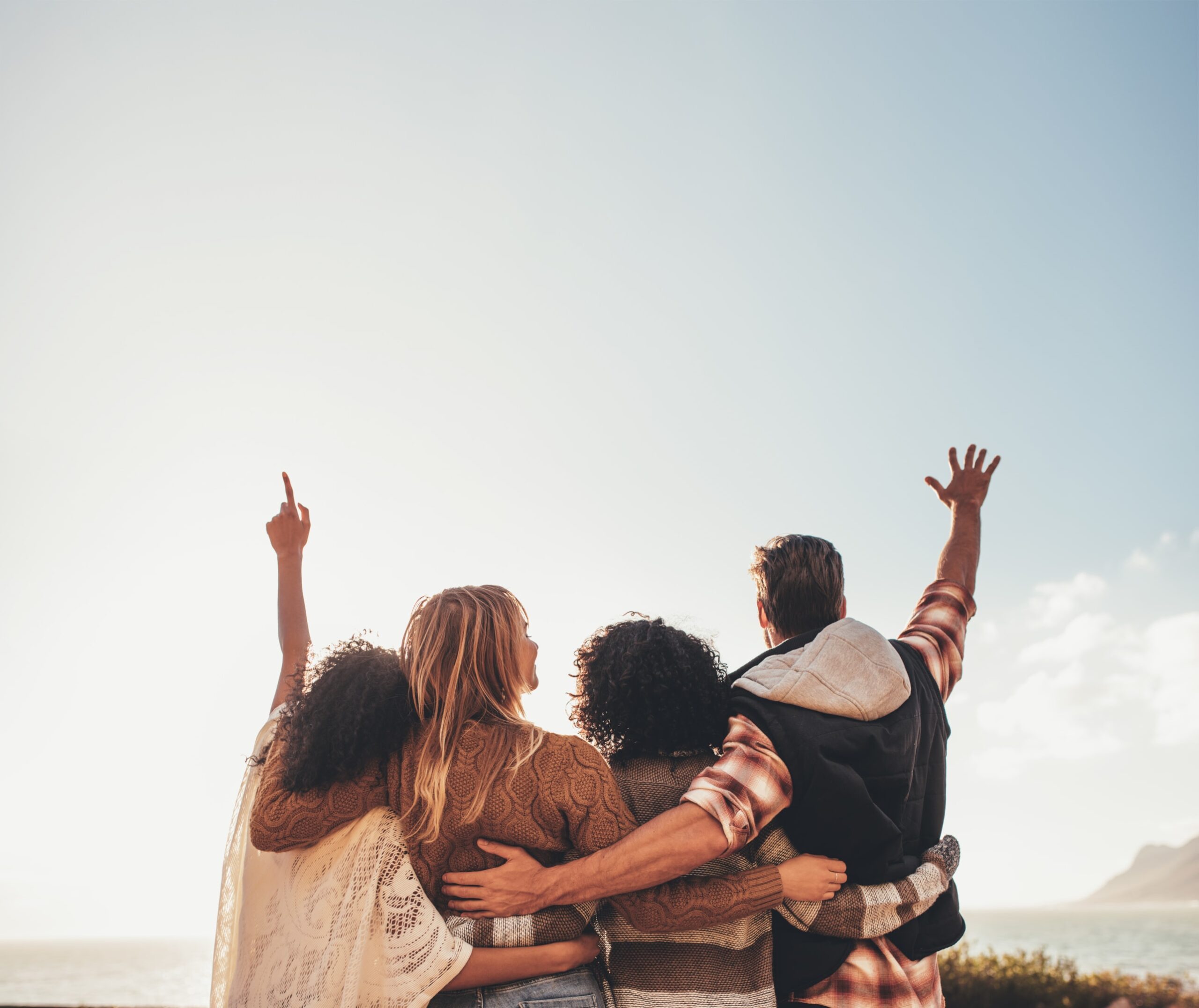 Group of individuals in a fertility support network sharing experiences and emotional encouragement in a safe, non-judgemental space.
