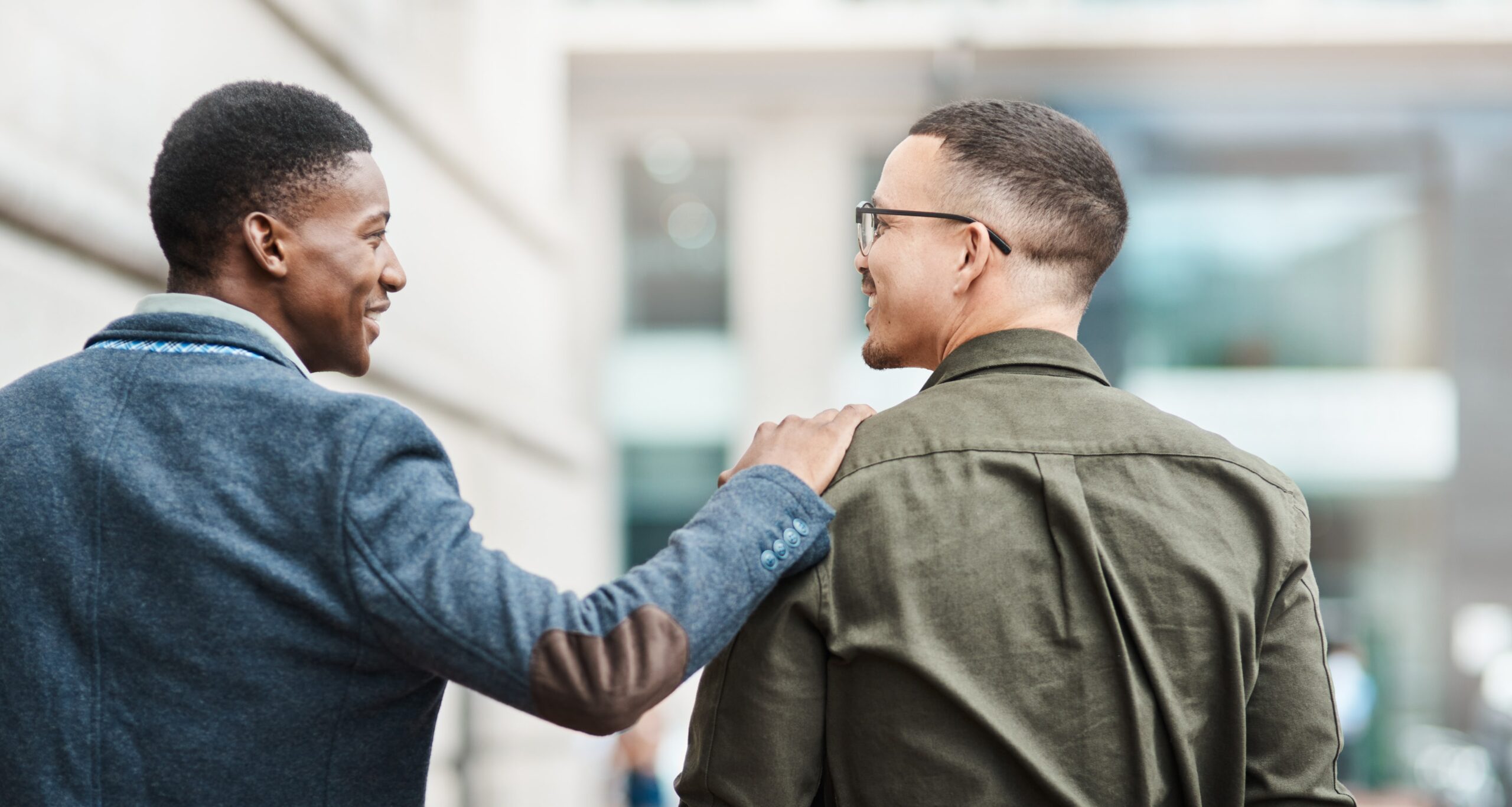 Friends offering emotional support to a man facing fertility challenges.